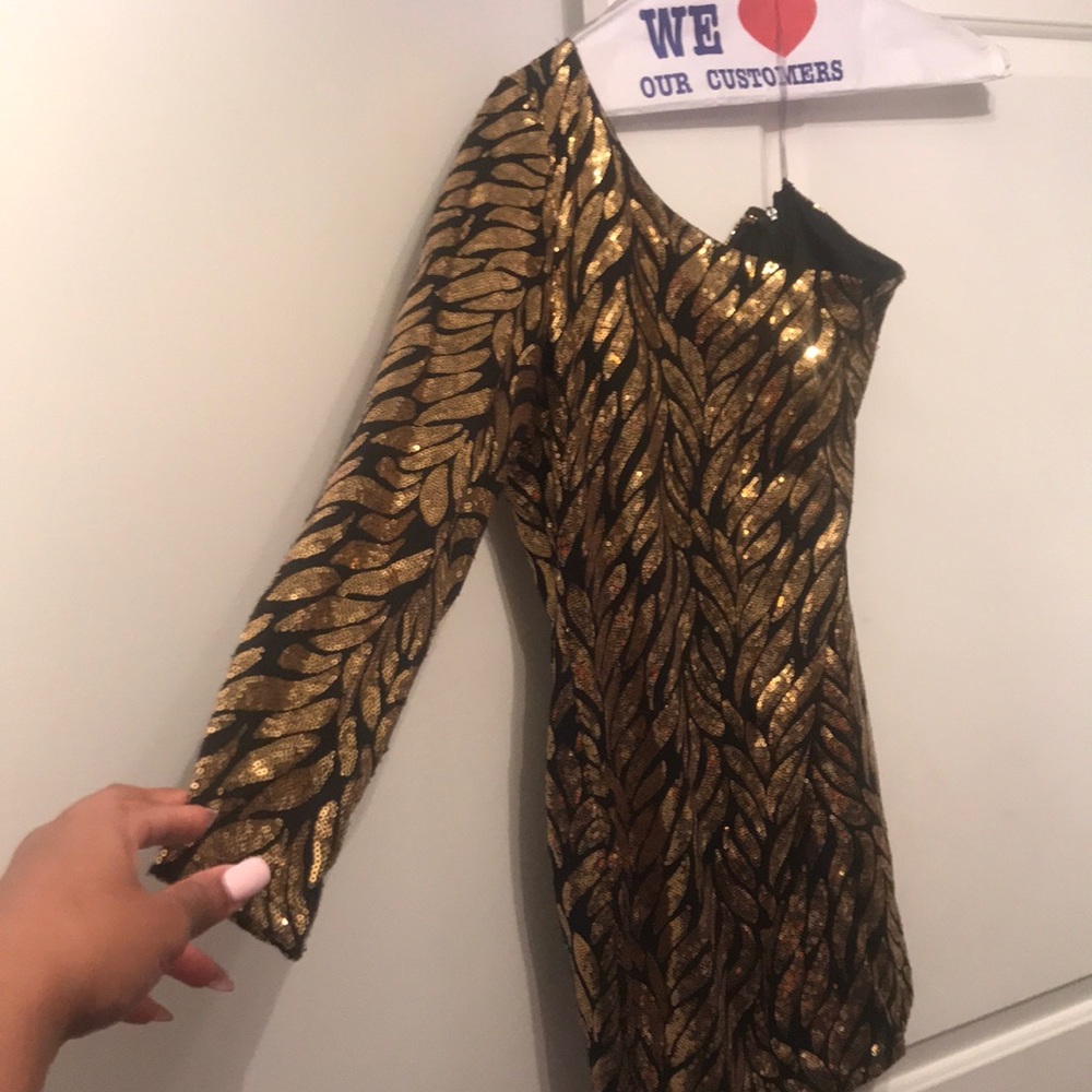 Gold and black sequin dress
